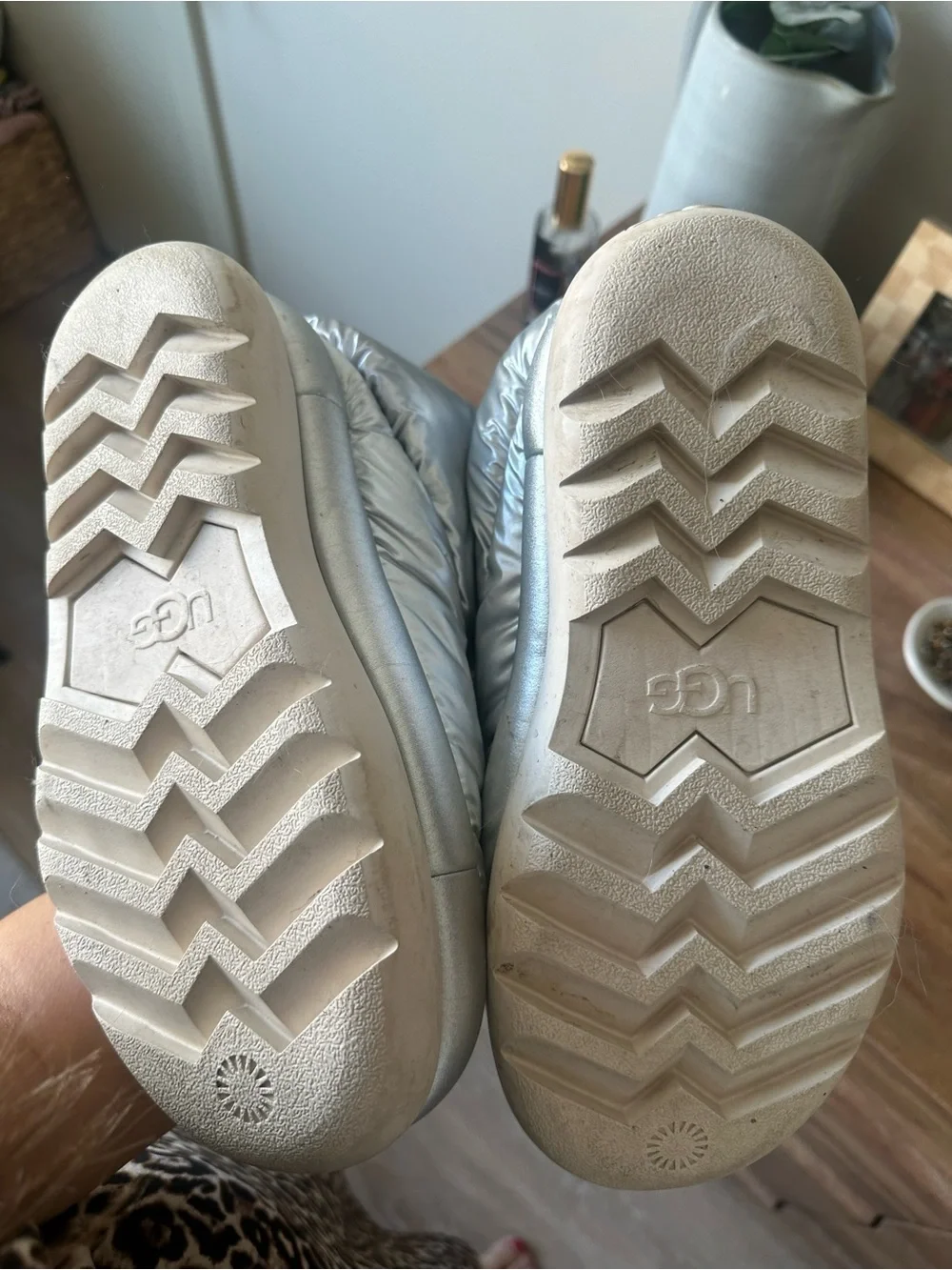 Silver Puffer Ugg boots with knotted detail